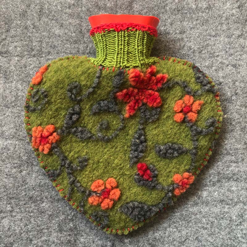 Grüne Wärmflaschen aus der Kollektion Herzenswärme